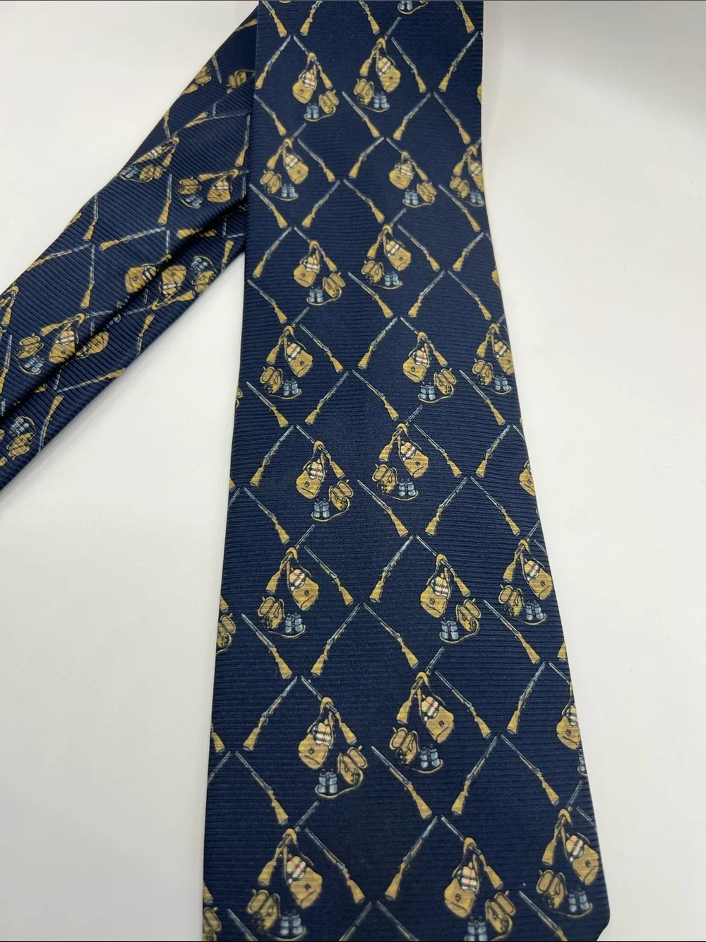 502. Burberrys Navy Tie with Gold Crest Pattern
